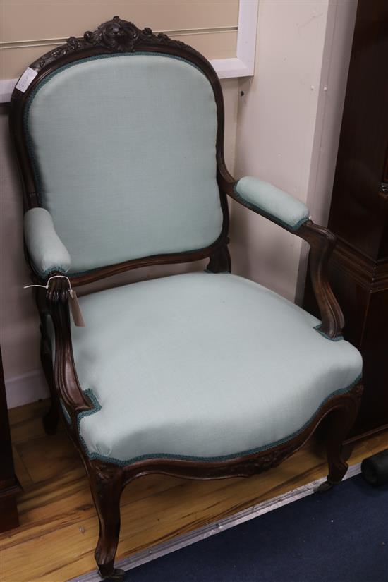 A pair of rosewood open armchairs